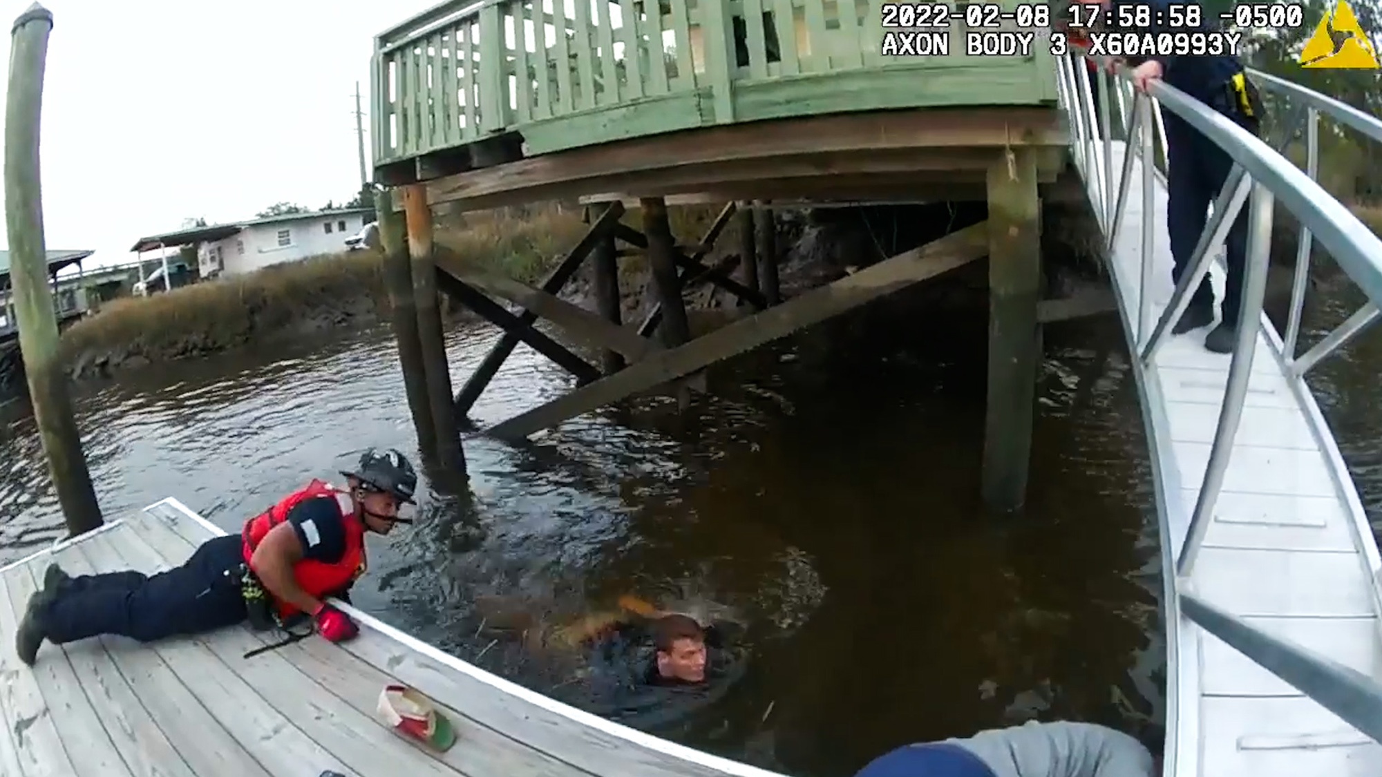 Cops Jump In Freezing River To Rescue Drowning Woman Trapped